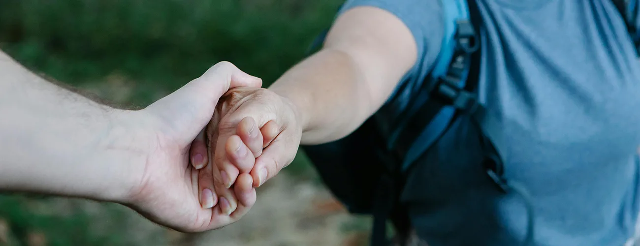 hand holding other hand
