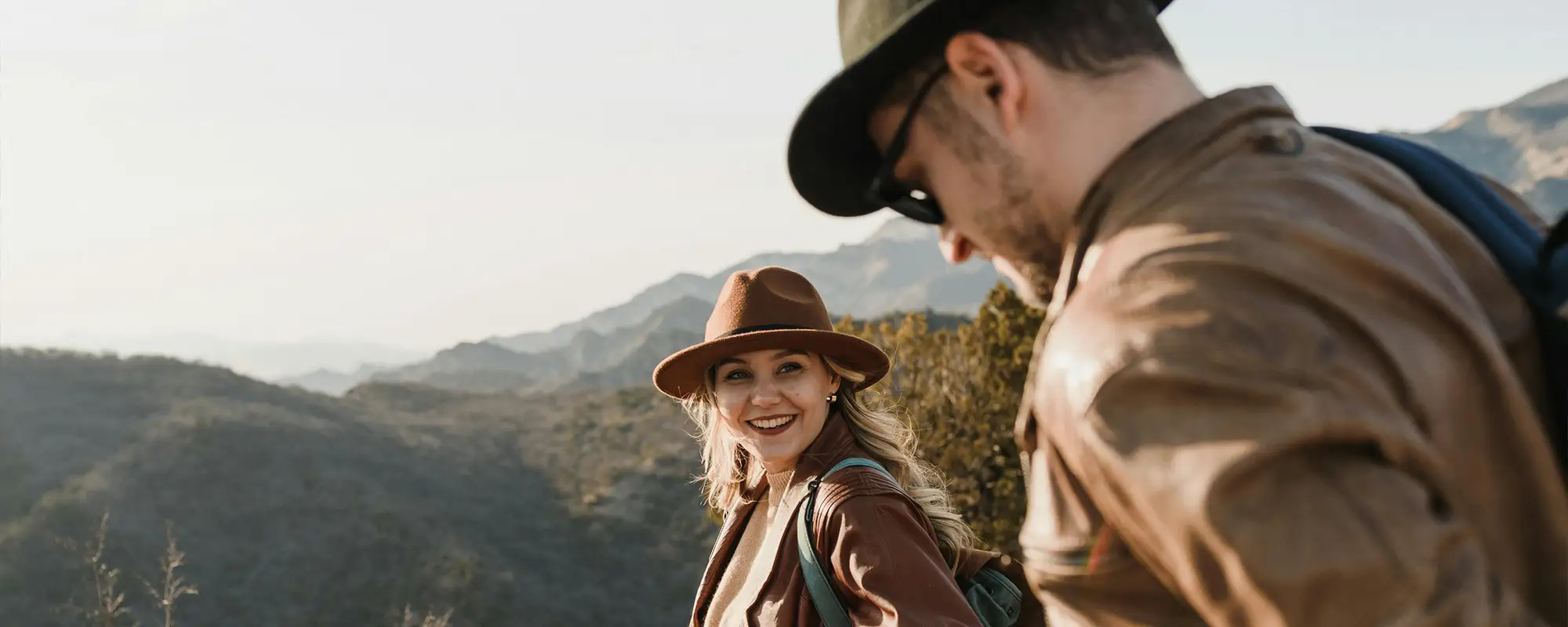 couple hking in hills